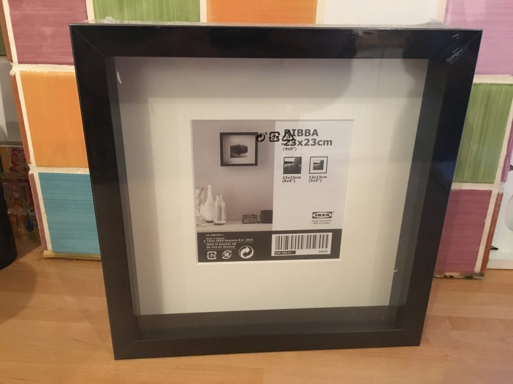 Get yourself an Ikea 23cm by 23cm square frame